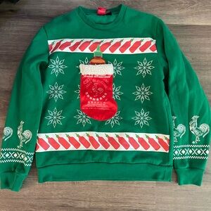 Festive Green Christmas Sweater with Red Accents